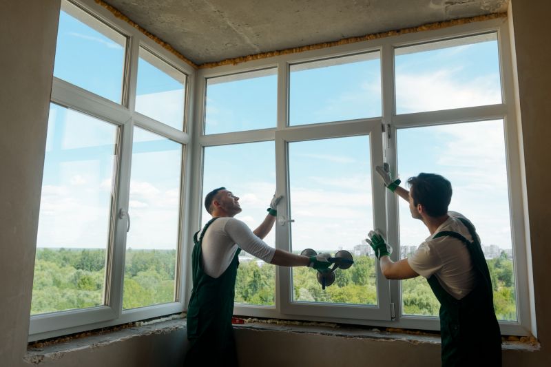 Professional Window Installers at Work